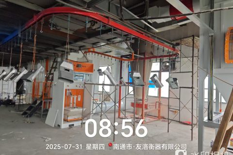江海之畔安装忙:新月电子仪器自动喷粉线设备落户南通