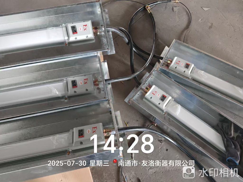 江海之畔安装忙:新月电子仪器自动喷粉线设备落户南通